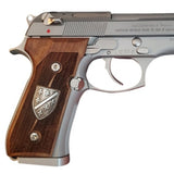 Beretta 92FS Custom Pistol Grips made of walnut wood with custom logo made of silver.