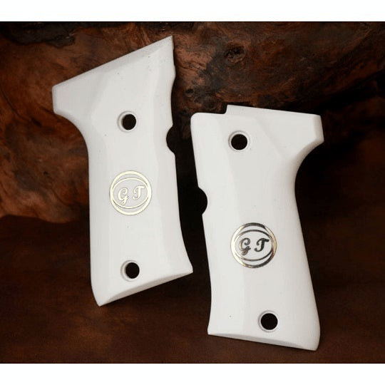 Beretta 92 Compact grips made of White Acrylic with custom logo made of silver.