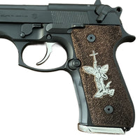 Beretta 92FS grips made of walnut wood with custom logos made of silver.
