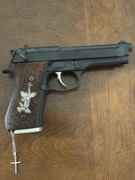 Beretta 92FS grips made of walnut wood with custom logos made of silver.7