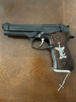 Beretta 92FS grips made of walnut wood with custom logos made of silver.8