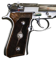 Beretta 92FS grips made of walnut wood with custom logos made of silver.3