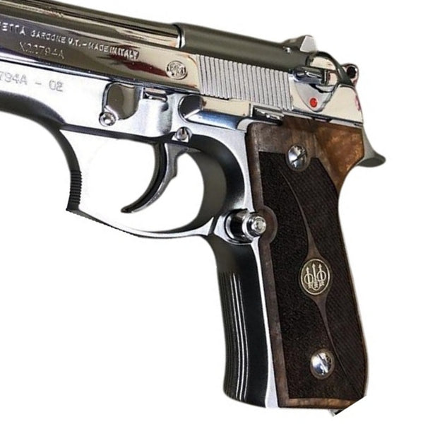 Beretta 92FS grips made of walnut wood with custom logos made of silver.