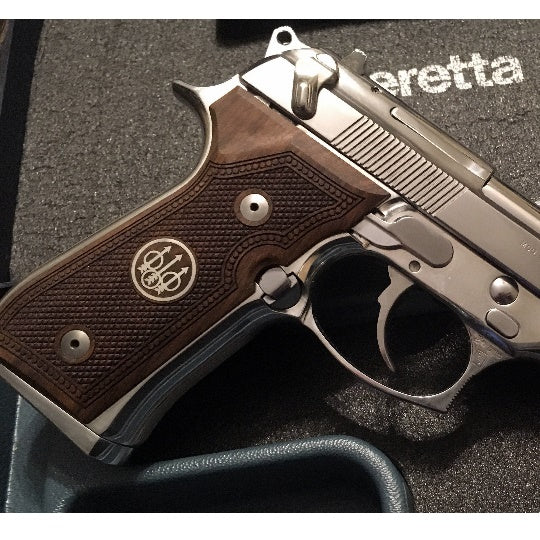 Beretta 92FS grips made of walnut wood with custom logos made of silver