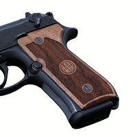 Beretta 92FS grips made of walnut wood with custom engraving.right