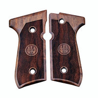 Beretta 92FS grips made of walnut wood with custom engraving.