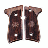 Beretta 92FS grips made of walnut wood with custom engraving.