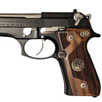 Beretta 92FS grips made of  walnut wood with custom logo and text made of silver.