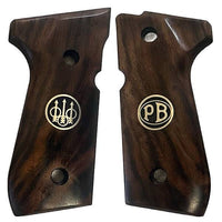 Beretta 92FS grips made of Root walnut with custom logo made of silver.1