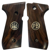 Beretta 92FS grips made of Root walnut with custom logo made of silver.2