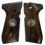 Beretta 92FS grips made of Root walnut with custom logo made of silver.2