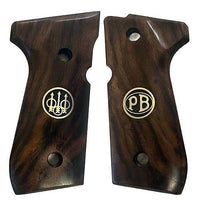 Beretta 92FS grips made of Root walnut with custom logo made of silver.