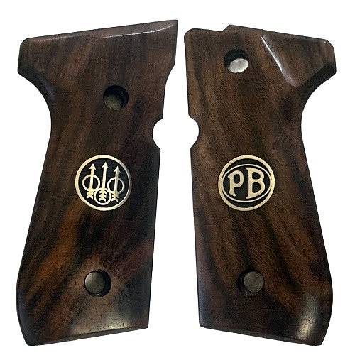 Beretta 92G grips made of Root walnut with custom logo made of silver.