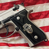Black acrylic Beretta M9A1 custom pistol grips with silver logo, designed for enhanced grip and style.