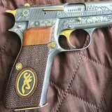 Walnut wood Browning Hi-Power pistol grips with custom brass logo for Browning Hi-Power handgun.