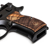 CZ P01 grips made of root walnut wood with waterline pattern and custom engraved logo on the left side.