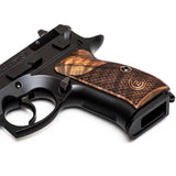 CZ P01 grips made of root walnut wood with waterline pattern and custom engraved logo, designed for CZ 75 compact pistol.
