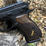 CZ P01 grips made of rich root walnut wood with waterline patterns and custom brass logo, designed for CZ 75 compact pistol.