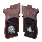 Cz 83 custom pistol grips made of walnut wood with a silver custom logo, designed for improved grip and aesthetics.