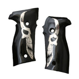 Sig Sauer M11-A1 custom grips made from black PMMA acrylic with silver skull inlay, designed for a stylish firearm upgrade.