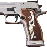 Sig Sauer P226 SAO custom grips in black PMMA acrylic with silver and brass skull inlay, designed for enhanced grip and style.