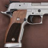 Sig Sauer P226 SAO custom grips made from walnut wood, featuring a smooth finish and ergonomic design for improved handling.