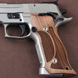 Sig Sauer P226 SAO custom grips made from walnut wood with integrated magwell for enhanced grip and handling.