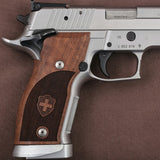 Sig Sauer P226 SAO custom walnut wood grips with intricate engraving, designed for enhanced grip and aesthetic appeal.