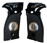 A pair of black grip covers for a firearm, featuring a textured grip pattern, a silver circular emblem, and the letters 'OP' near the top, shown against a plain white background.