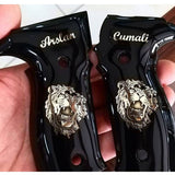 Sig Sauer P226 custom grips made from black PMMA acrylic with silver logo and text inlay, designed for ergonomic handling.