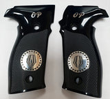 A pair of black pistol grip covers with a textured grip pattern, a silver circular emblem, and the letters 'OP' at the top, displayed on a white background.