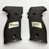 Sig Sauer P226 custom grips made from black PMMA acrylic with silver logo inlay, designed for enhanced grip and style.