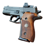 Sig Sauer P226 custom walnut grips with dragonskin checkering and silver logo inlay, designed for enhanced grip and style.