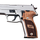 Sig Sauer P226 Legion custom walnut grips with dragon skin checkering and engraved logo, designed for enhanced grip and style.
