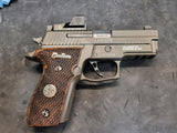Sig Sauer P226 custom grips made from walnut wood with silver logo and inlay, designed for ergonomic handling and style.