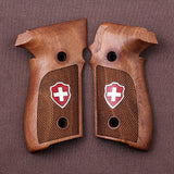 Sig Sauer M11-A1 custom walnut grips with silver logo inlay for P226 pistol, showing detailed wood grain and sleek finish.