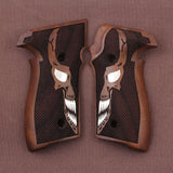 Sig Sauer P226 custom grips made from walnut wood with silver skull inlay, designed for enhanced grip and aesthetic appeal.