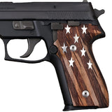 Sig Sauer M11-A1 pistol  grips, showing textured grip surface and ergonomic design.