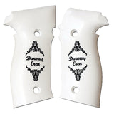 A pair of white pistol grip covers with black ornate scrollwork and the text 'Durmış Eren' printed on each, shown on a plain white background.