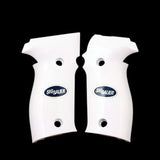 Sig Sauer M11-A1 custom grips made from white PMMA acrylic with silver Sig Sauer logo on a pistol.