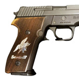 Sig Sauer M11-A1 custom grips made from white PMMA acrylic with silver logo inlay on Sig Sauer P226 handgun.