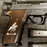 Sig Sauer P226 M11-A1 custom grips made from white PMMA acrylic with silver logo inlay on the firearm grip.