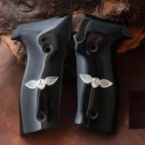 Sig Sauer P228 custom grips made from black PMMA acrylic with silver logo inlay, designed for improved grip and style.