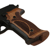 Sig Sauer P229 custom walnut wood grips with professional target design for enhanced pistol handling and aesthetic appeal.