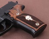 Sig Sauer P229 custom grips made from walnut wood with silver logo inlay, designed for enhanced firearm handling and aesthetics.