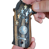 Walnut wood Sig Sauer P229 custom grips with silver logos and name inlay, designed for enhanced firearm handling.