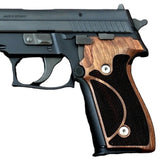 Sig Sauer P226 Legion custom grips made from walnut wood, featuring detailed grain and ergonomic design.