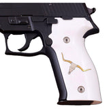 Sig Sauer P229 custom grips made from white PMMA acrylic with silver and brass logo inlays, designed for enhanced firearm handling.