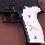 Sig Sauer P229 custom grips made from white PMMA acrylic with silver and brass logos inlay, designed for enhanced firearm handling.