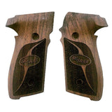 A pair of Sig Sauer pistol grip covers made of brown wood with dark textured inlays and an engraved Sig Sauer logo on each piece, shown against a plain white background.